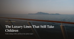 A ship deck railing above calm water at dusk with an island on the horizon, headline The Luxury Lines That Still Take Children